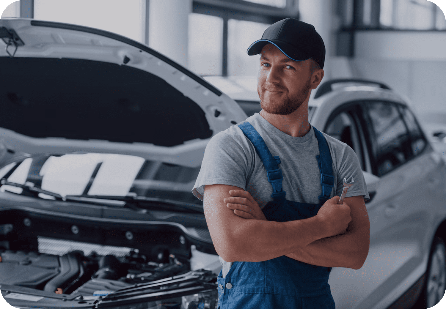 professional car maintenance expert looking at camera professional car maintenance expert looking at camera